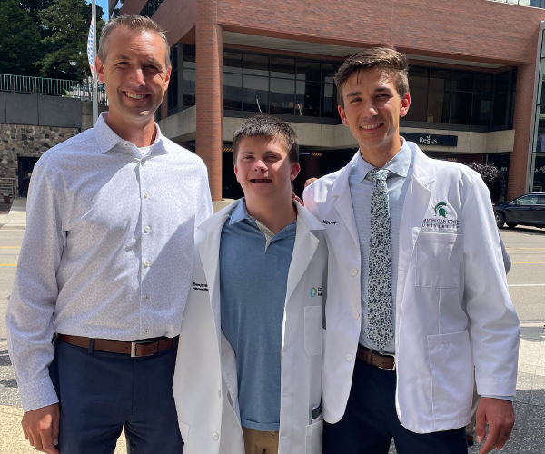 Luke Schipper, on the far right, with his brother Drew in the middle and father on the left.
